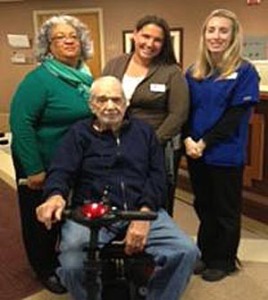 L-R: Janice Jackson, Activities Director; Jenny Niece, Marketing Director; Leah Simpkins, Rehabilitation Director; and seated, Loran "Kirk" Kirkwood