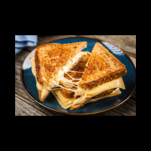 Kick Up Your Grilled Cheese for National Grilled Cheese Day on Wednesday, April 12 There are so many variations on the grilled cheese sandwich today; your choices are only limited by your tastes and imagination! What you’ll need: Butter, Bread, and Your Choice of Cheese! Try the following combinations for six new exciting ways to enjoy a grilled cheese. Feel free to mix-and-match the add-ins and create your own! Add thinly sliced grilled Canadian bacon and an over-easy to over-medium egg to your favorite cheese. Spread two tablespoons of your favorite BBQ sauce on top of the cheese. Top the sauce with three strips of crispy black pepper bacon. Smear a thin layer of apple butter on the inside of your bread before a layering of brie, topped by thinly sliced red apple. Spread a light layer of cranberry sauce on the inside of the bread before topping it with your favorite cheese and a layer of honey-roasted turkey. Smear one tablespoon of pesto on the inside of your bread, and top with tomato slices. Add thick-cut mozzarella and sprinkle lightly with Italian seasoning. Smear bread with softened cream cheese, and top with finely chopped jalapenos. Add crispy bacon and sprinkle lightly with garlic powder.