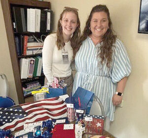 two Kenwood Nursing and Rehabilitation Staff pictured at 4th of July party